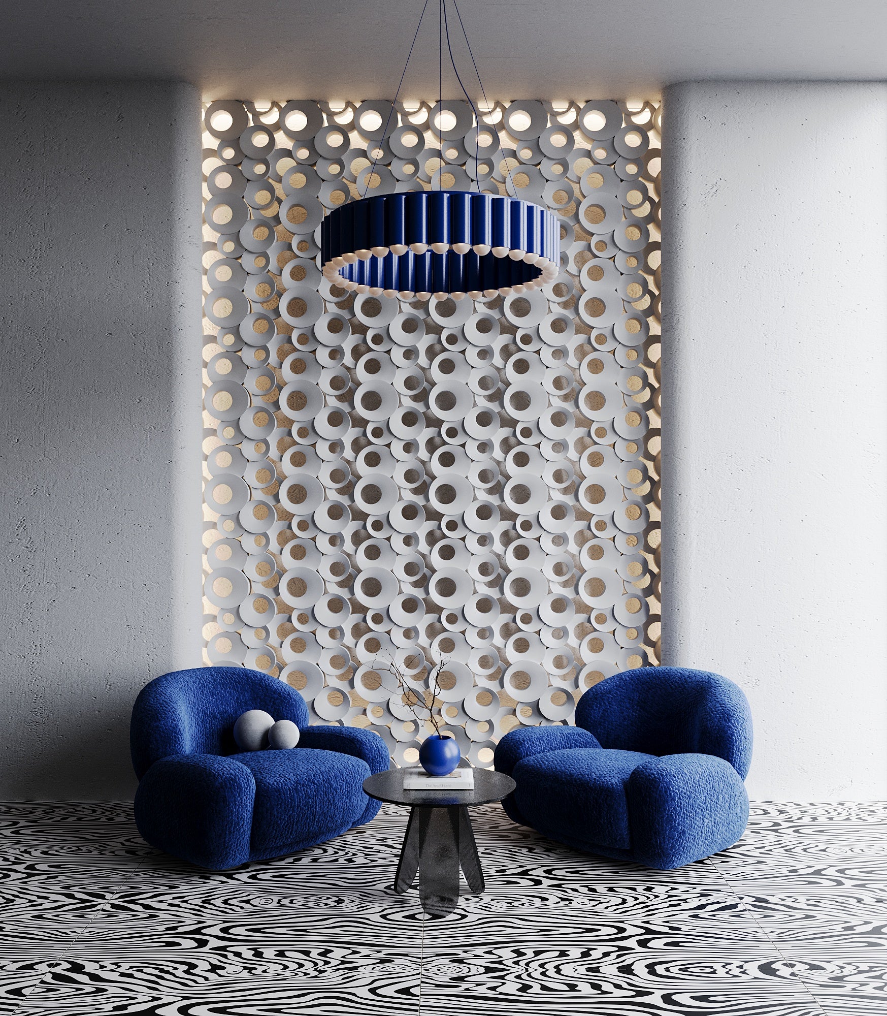 Modern interior featuring Kandes FOAM 3D gypsum wall panels with a sculptural circular pattern, backlit for an elegant ambient glow. The plaster wall panels create a dynamic visual effect, complemented by bold blue lounge chairs, a statement pendant light, and a contemporary black-and-white patterned floor. Ideal for high-end residential and commercial spaces, these decorative panels add texture and depth while maintaining a sleek, minimalist aesthetic.