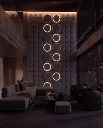 COSMIC 0012 LED gypsum 3D wall panels glowing on a dark living room feature wall at night