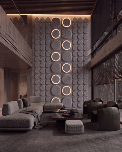 Kandes COSMIC 0212 LED gypsum 3D wall panels with halo rings on a living room feature wall at dusk